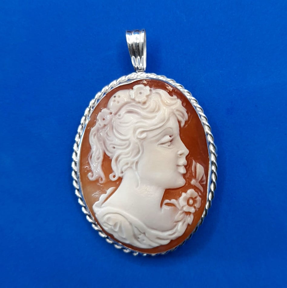 SPILLA CON IL VOLTO IN ARGENTO 925%